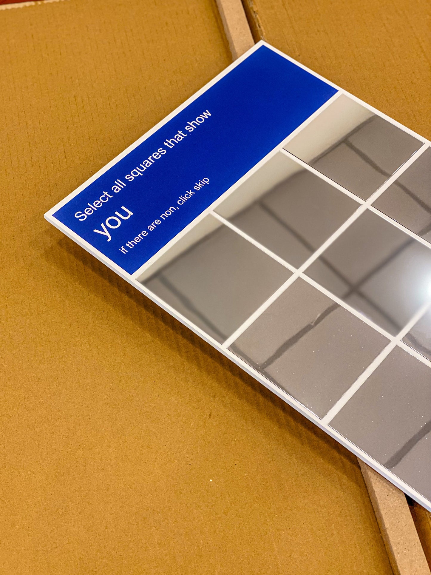 CAPTCHA wall mirror 12x18 inch novelty mirror, angled view showing acrylic mirror tiles